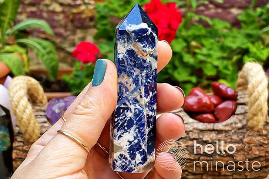 sodalite blue energy tower crystal on hand